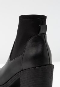 Even&Odd Tronchetti - black