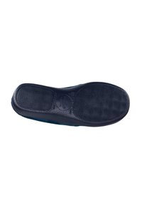 Suela de zapato de goma negra con patrón de agarre texturizado y forma redondeada. Presenta un borde liso y un detalle del logotipo en el centro.