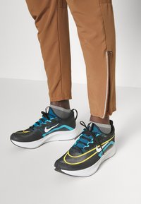 Nike Performance ELITE - Calças - ale brown/silver