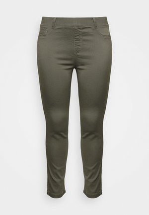 Olivgröna skinny jeans med en slät yta, framfickor och dragkedja. Har en figurnära silhuett och smala anklar.