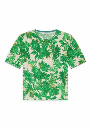Short-sleeve, round-neck shirt with all-over green tropical leaf pattern on a beige background.