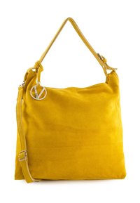 Gul nubuck skuldertaske med en enkelt håndtag og en justerbar rem. Har et sølvfarvet rundt logo og en blød tekstur.