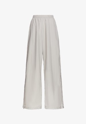 Light beige wide-leg pants with elastic waistband and subtle decorative trim running down the outer side seams, displayed on a white background.