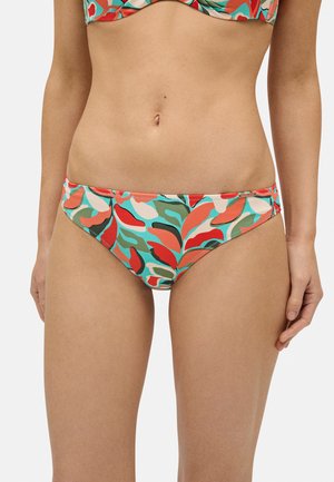 Bikini de fondo en un patrón de hojas multicolores que presenta tonos de rojo, verde y azul. Fabricado con tela elástica y un corte bajo.