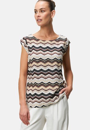 Patterned short-sleeve top featuring a wavy design in black, white, and earthy tones. Soft fabric with a relaxed fit and round neckline.