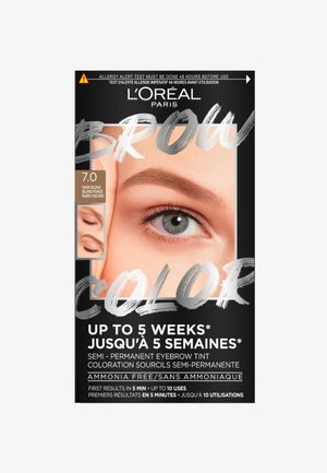 Le kit de couleur pour sourcils L'Oréal Paris avec un emballage noir audacieux présente un gros plan d'un sourcil de mannequin, étiqueté comme blond foncé, avec un avertissement d'allergie.