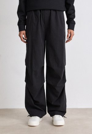 HAFISA - Trousers - black