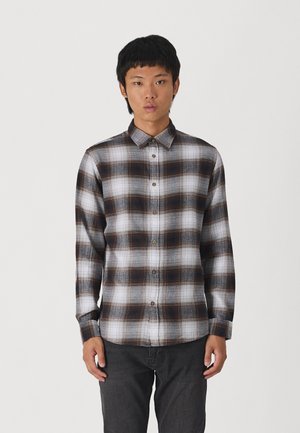 Long-sleeve plaid shirt in white, brown, and gray. Features a classic collar, button front, and a regular fit. Soft fabric texture.