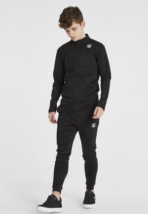 ATHLETE - Pantalon de survêtement - black