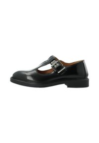 Black leather Mary Jane shoe with a T-strap, silver buckle detail, rounded toe, and a low sole. Smooth texture with a polished finish.