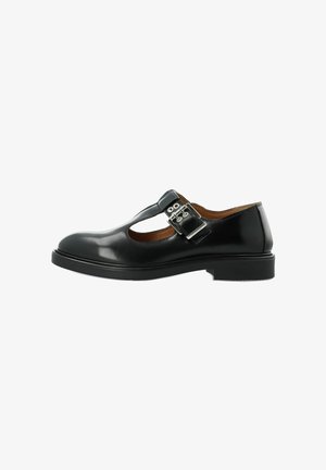 Zwarte leren Mary Jane-schoen met een T-strap, zilveren sluiting, ronde neus en een lage zool. Gladde textuur met een gepolijste afwerking.