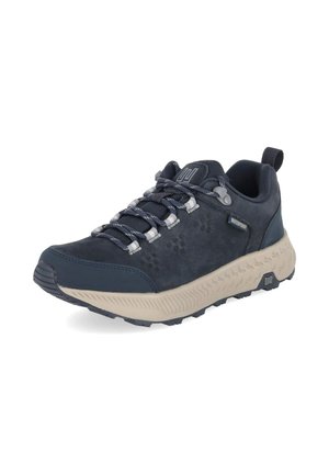 Zapatilla impermeable azul oscuro con cordones grises y suela gruesa beige, diseñada para uso al aire libre o casual.