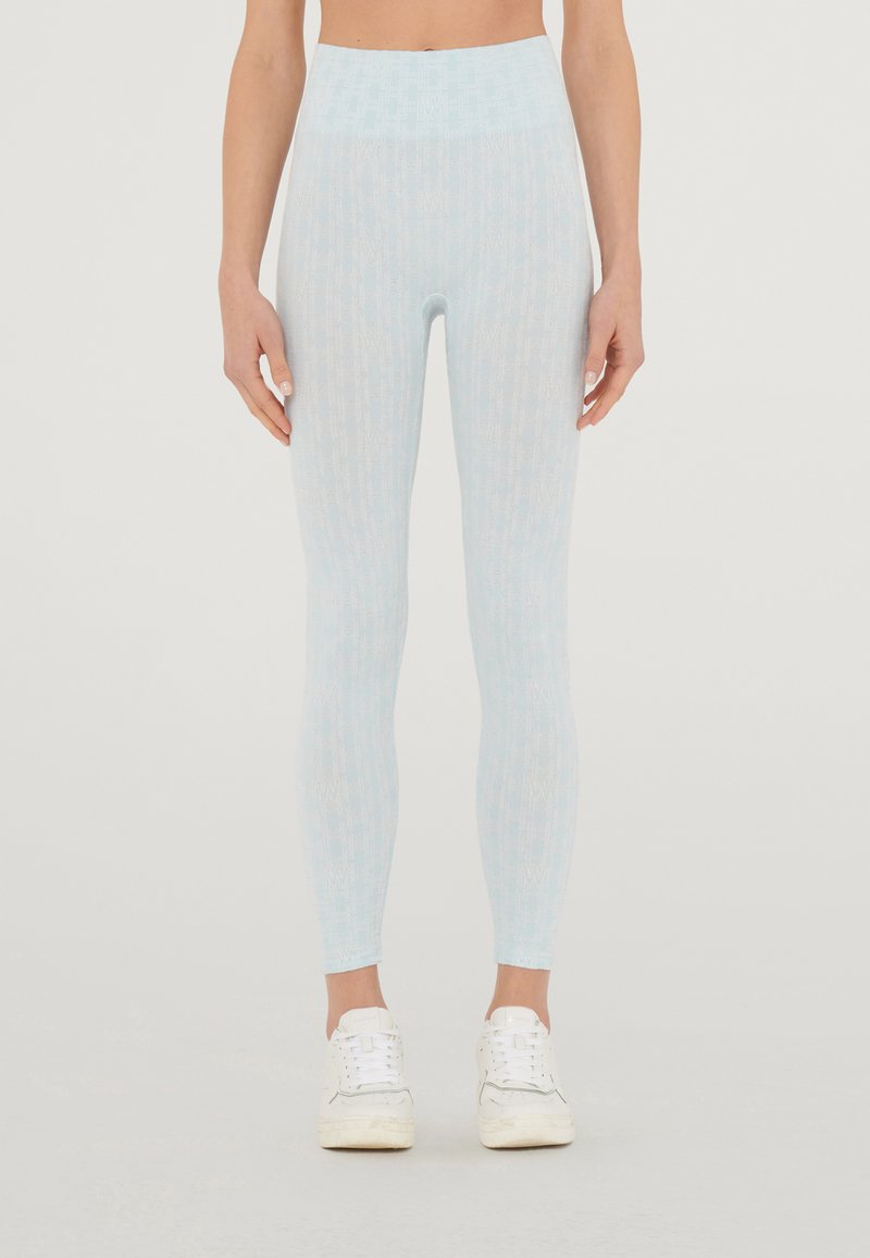 Wolford SUCCESSION LOGO CHAIN - Leggings - Hosen - light aquamarine/off ...