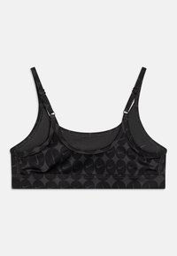 Fekete sportmelltartó texturált anyaggal, amelyen ismétlődő Nike logóminta található. Állítható pántok és varrás nélküli, lekerekített kialakítás lágy élekkel.