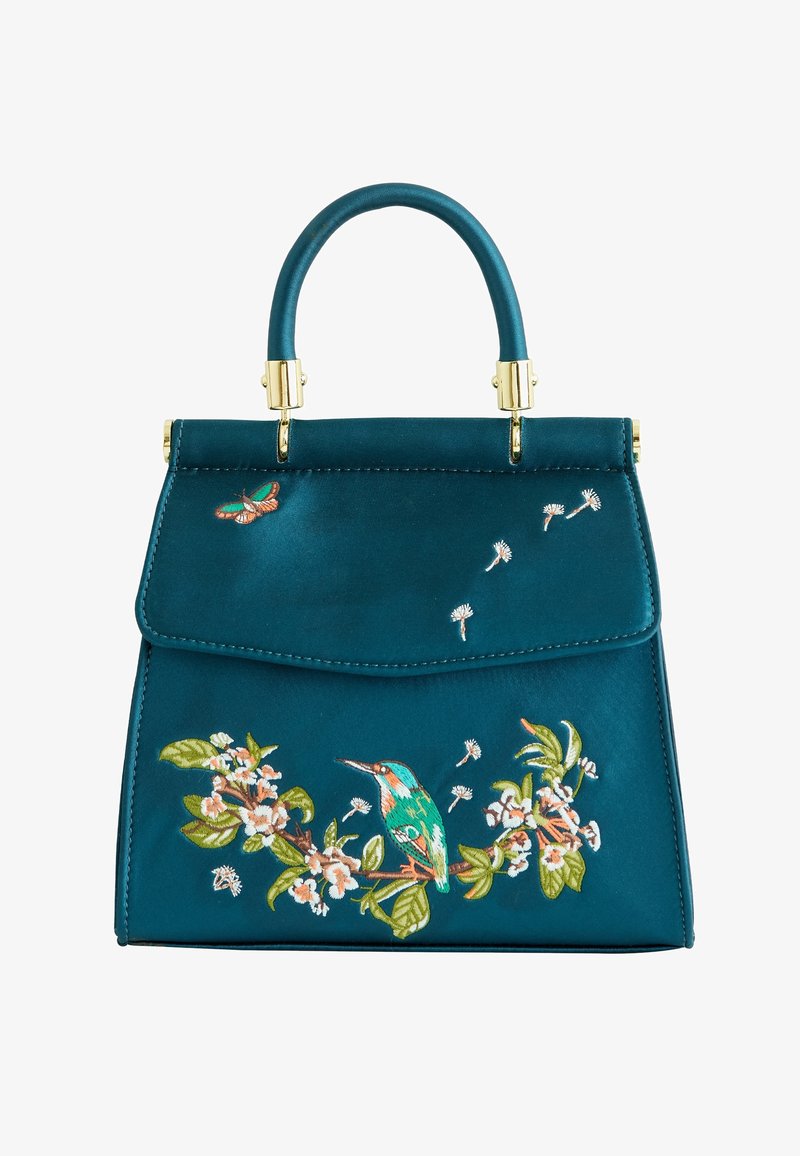 Turkizna satenska torba z zlatim okovjem, ki na sprednji strani vsebuje podrobno vezenje ribjega kralja in cvetličnih motivov. Strukturna zasnova, zgornja ročaja.