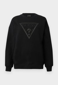 Sudadera negra de cuello redondo con gran logotipo en relieve negro de Guess en forma de triángulo y el texto "GUESS U.S.A. Washed Jeans" en el frente.
