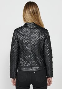 Koroshi Giacca in similpelle - black
