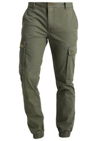 Cargo pants in olijfgroene katoenstof met elastische manchetten, twee zijzakken en één kleppen zak met knoopdetails. Glad textuur.