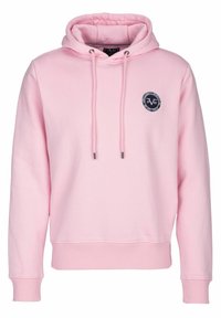 Světle růžová mikina s kapucí, šňůrkami, žebrovanými manžetami a spodním lemem, a kulatou nášivkou na hrudi. Vyrobena z měkkého materiálu.