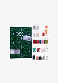 Calendrier de l'Avent avec un emballage vert comportant le texte blanc "essie", incluant 24 vernis à ongles de différentes couleurs et textures, ainsi que deux produits de soin.