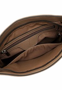 Brown leather handbag interior with multiple compartments, including a zippered pocket and smooth fabric lining, all in a soft, earthy tone.