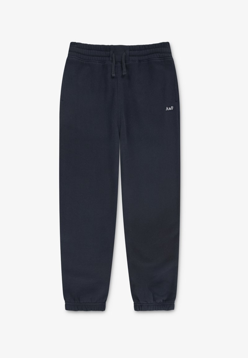 Mörkblå joggerbyxor med elastiskt midjeband, justerbar dragsko, nederdelar med mudd och liten broderad logotyp på sidan. Mjuk tygkänsla.