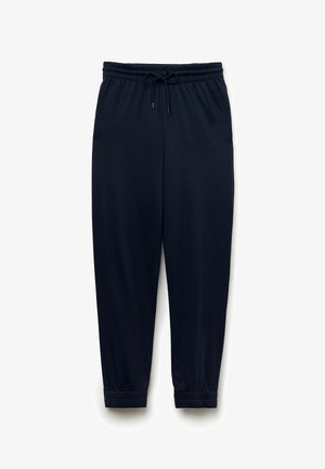 Dunkelblaue Jogginghosen aus weichem Stoff, mit einem elastischen Bund und einer Kordel sowie schmal zulaufenden Bündchen an den Knöcheln.