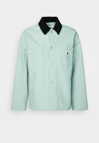 Unselected, frosted green/black rinsed