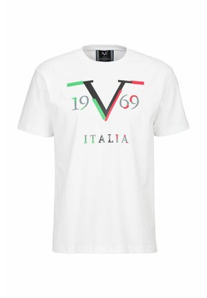 White cotton t-shirt featuring a graphic design with a large green and red "V," the year "1969," and "ITALIA" in gray text.