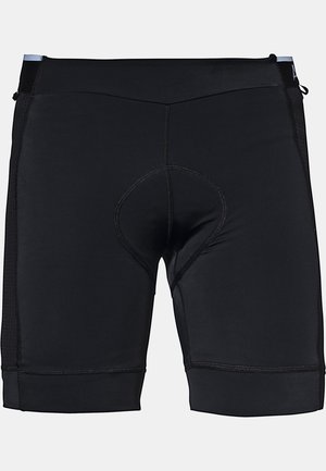 Black cycling shorts made of stretch fabric, featuring a padded seat area, flatlock seams, and mesh side panels for breathability.