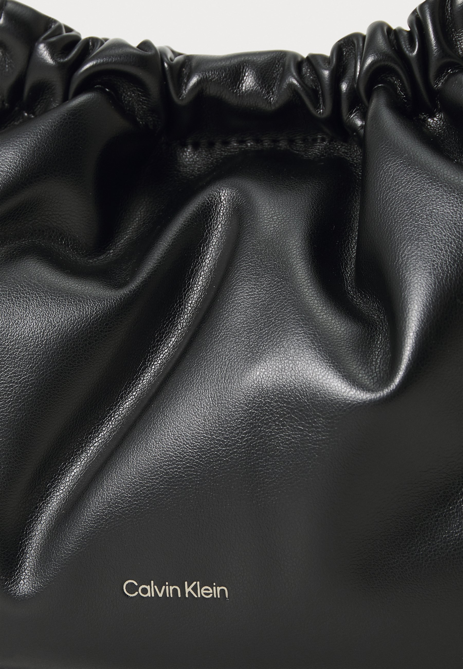 Calvin Klein Jeans DRAWSTRING BAG - Cross body bag - black