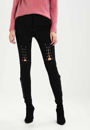 Vaqueros pitillo - black