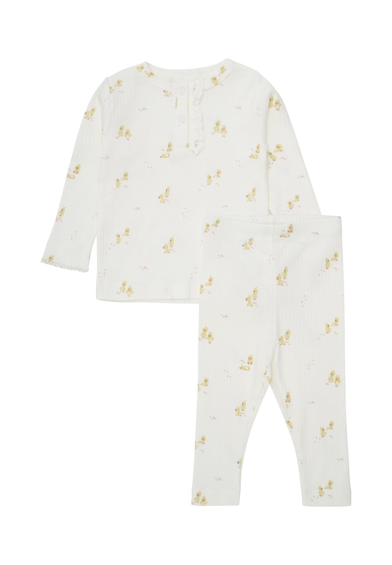 Sæt af bomuldspyjamas bestående af en langærmet top og leggings. Hvidt stof med ribbet tekstur og mønster af pastelfarvede kyllinger. Flæse detaljer ved halsudskæringen.