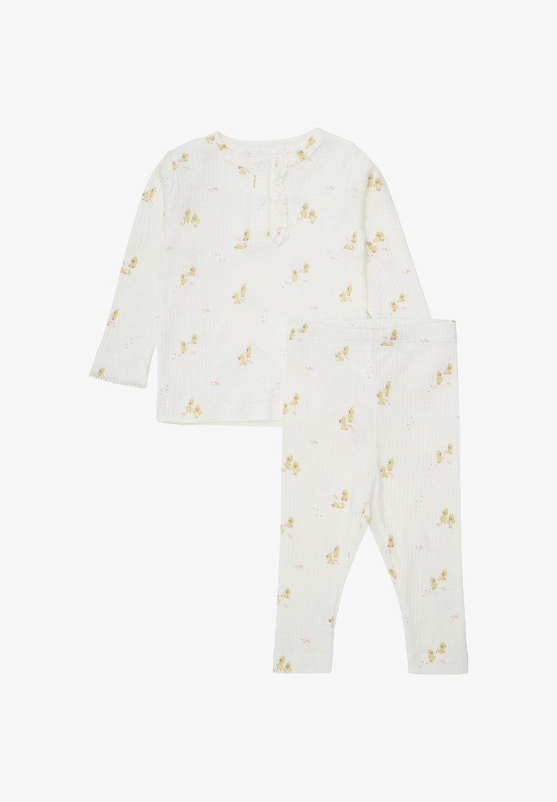 Baumwoll-Pyjama-Set mit langärmeligem Oberteil und Leggings. Weißer Stoff mit gerippter Textur und pastellgelbem Kükenmuster. Rüschendetail am Ausschnitt.