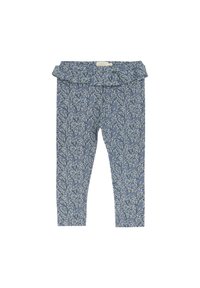Leggings bleus à motifs avec une ceinture à volants, présentant un design floral en blanc et vert sur un tissu texturé.