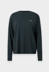 Ciemnozielona, długorękawowa koszulka z miękkiej bawełny. Posiada okrągły dekolt oraz małe, haftowane logo "OBEY" na piersi.