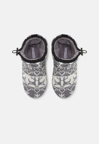 Gray and white slipper socks with a reindeer pattern, soft fleece interior, adjustable top with a black toggle, rounded toe design.