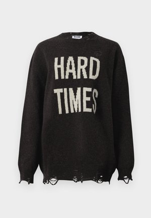 Black knitted sweater featuring the phrase "HARD TIMES" in cream color, with distressed hem and cuffs, and crew neck design.