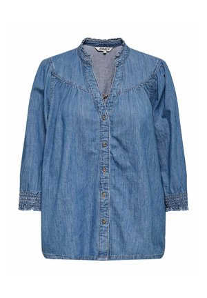 Denim bluzica v svetlo modri barvi z gumbi spredaj, nabranimi detajli in elastičnimi manšetami. Ima ovratnik in mehak material.