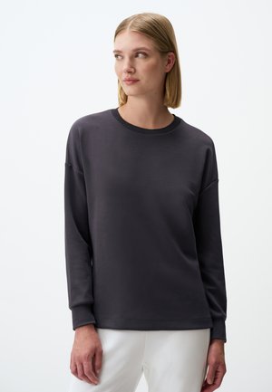 Donkergrijze lange mouwen pullover met een ronde hals en ribgebreide manchetten. Zacht materiaal met een gladde textuur, met een relaxed fit.