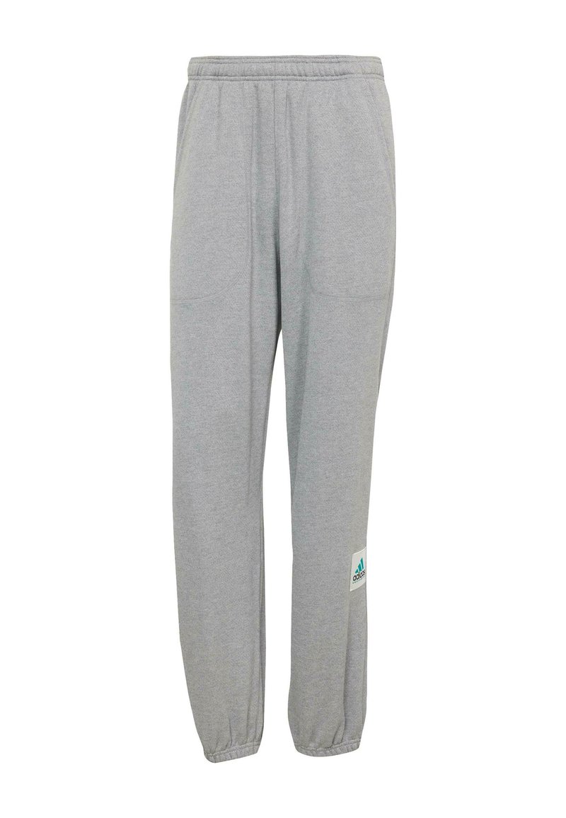 Pantalon de jogging gris en tissu doux, doté d'une taille élastique, de deux poches latérales et d'un logo Adidas bleu-vert sur la jambe gauche.