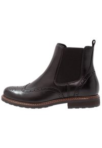 Botín de cuero negro hasta el tobillo con un acabado suave, paneles laterales elásticos, detalles decorativos de brogue y una suela de goma texturizada.