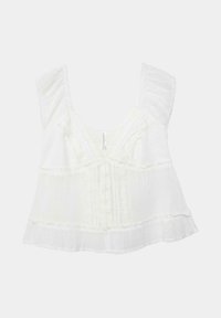Blouse blanche courte sans manches avec épaules volantées, détails en dentelle verticale et ourlet évasé.