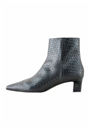 Black ankle boot with low block heel and textured, square-patterned leather surface, shown from the side on a white background.