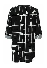 Schwarz-weiße Hemd mit kräftigen, übergroßen Textmustern. Kurze Ärmel mit umgeschlagenen Säumen. Leichter Stoff und lockerer Schnitt.