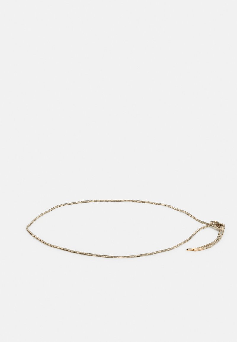 Thin, metallic cord in muted gold with a smooth texture, featuring a sliding knot closure and a small gold tip detail.