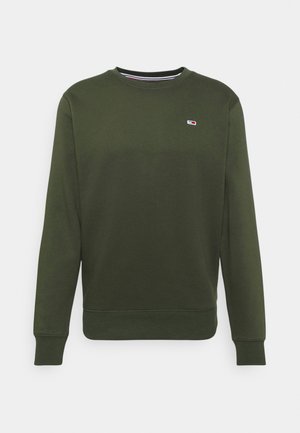 Donkergroene crewneck sweatshirt met lange mouwen en een klein geborduurd logo in rood, wit en blauw op de linkerborst.