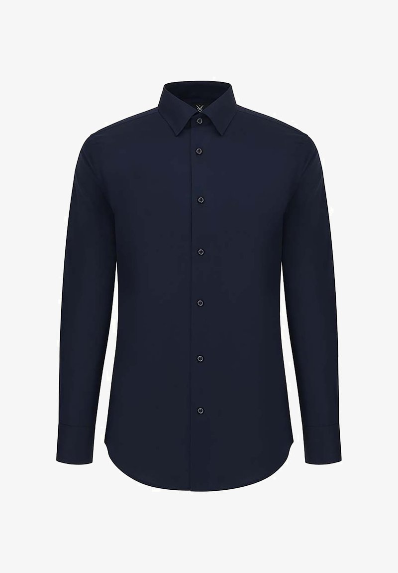 Granatowa koszula z długim rękawem uszyta z gładkiego materiału. Posiada kołnierzyk zapinany na guziki, guziki z przodu, dopasowany krój i zaokrąglony dół.