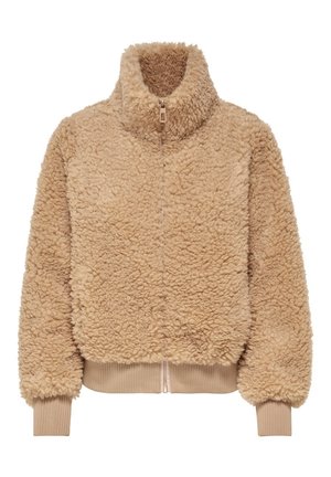 Beżowa krótsza kurtka z polaru z zamkiem błyskawicznym z przodu, wysokim kołnierzem, ściągaczami na mankietach i dole, o miękkiej, puszystej fakturze.