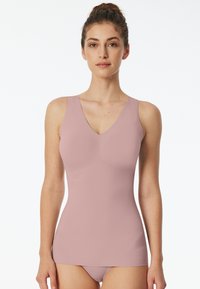 V-neck pink swim top with wide straps. Smooth texture and fitted design, paired with matching bikini bottoms.